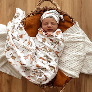 Shop the $20 Dino Muslin Wrap Collection