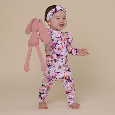 Toddler wearing Blushing Beauty Organic Snugglesuit Convertible Romper with Frill | Snuggle Hunny