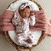 Baby wearing Cherry Blossom Organic Snuggle Sleepsuit Zip Footie with Frill