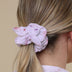 Woman wearing Coral Organic Scrunchie | Snuggle Hunny
