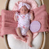 Baby wearing Coral Short Sleeve Organic Bodysuit with Frill | Snuggle Hunny