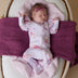 Baby wearing Coral Organic Snuggle Sleepsuit Zip Footie with Frill | Snuggle Hunny